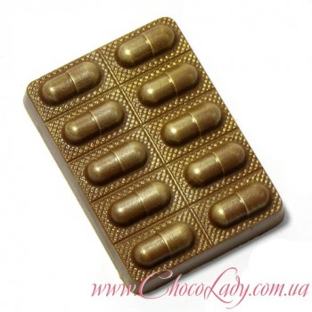 Шоколадні таблетки у капсулі
